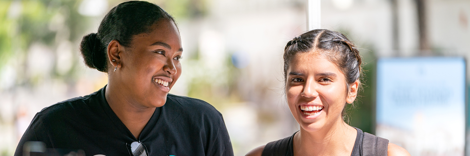 Two SDSU students, smiling